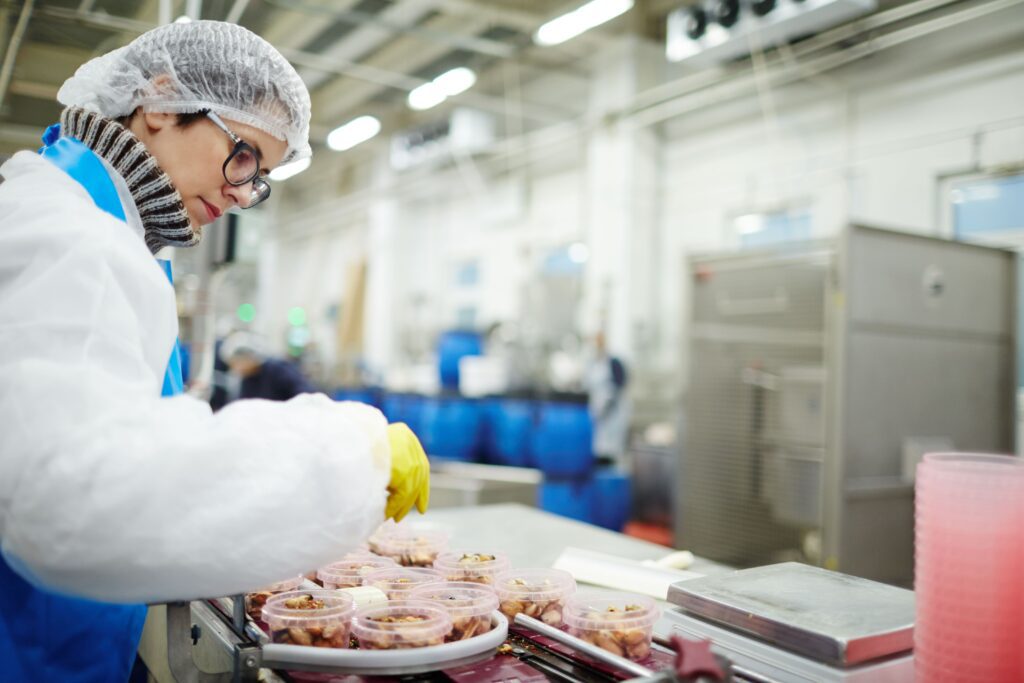 A woman working in the food production industry